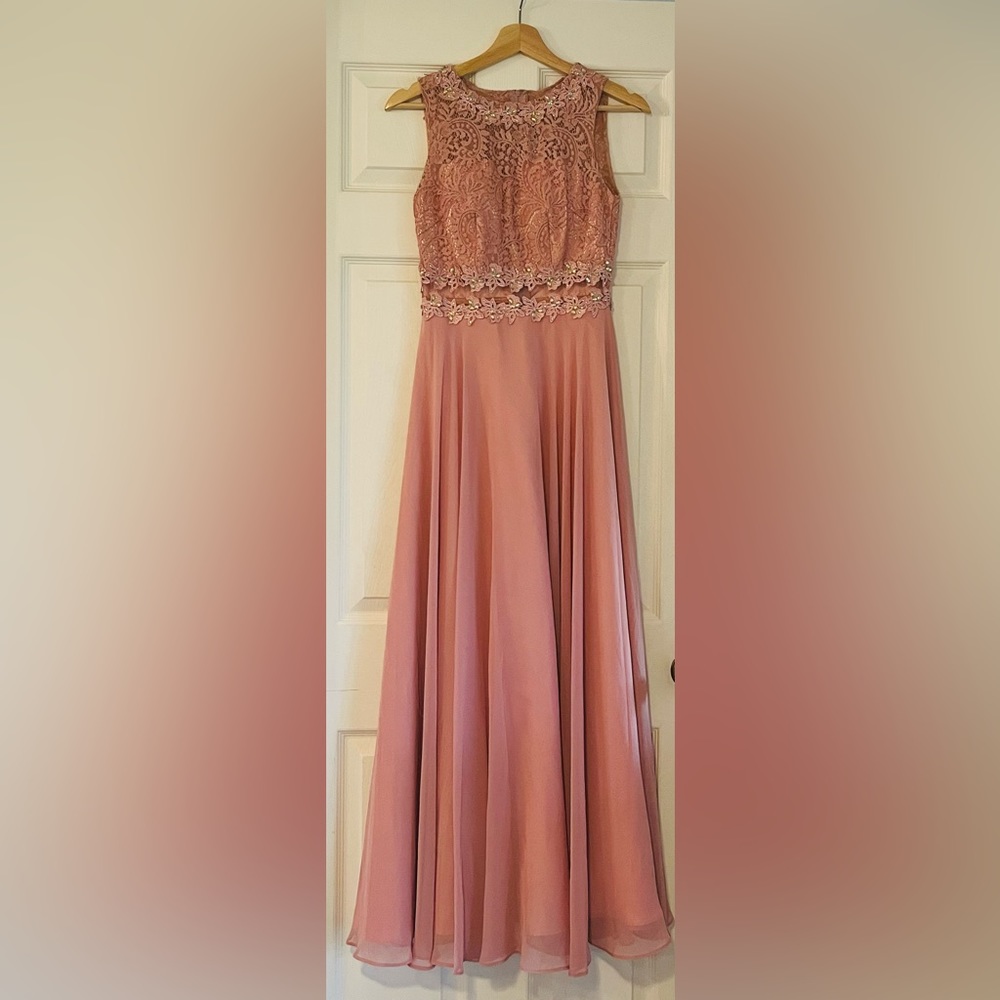 Gorgeous pink evening gown with beaded detailing.
